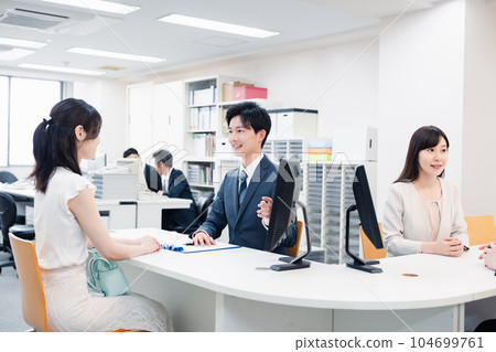 Staff at the counter 104699761