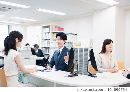 Staff at the counter 104699764