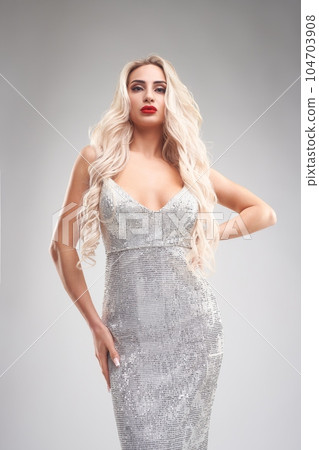 Stylish woman in white dress Stylish woman in white dress 104703908