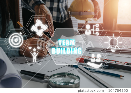 Team building concept, Construction team worker working in office with team building icon on virtual screen. 104704390