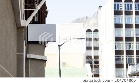 Blank sign fixed to building wall with copy space Blank sign fixed to building wall with copy space 104704800
