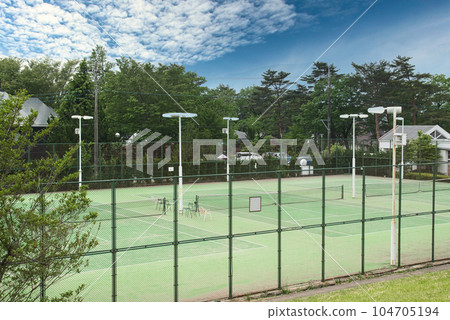 Tennis courts at a refreshing highland resort Tennis courts at a refreshing highland resort 104705194