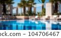 Blurred background of an outdoor swimming pool near the hotel. 104706467