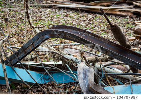Bent steel I-beams during demolition of a building Bent steel I-beams during demolition of a building 104707987