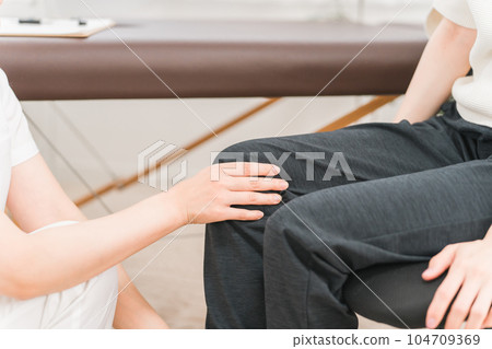 Asian female doctor, physiotherapist, nurse and patient rehabilitating and examining leg and knee injuries at hospital and orthopedics Asian female doctor, physiotherapist, nurse and patient rehabilitating and examining leg and knee injuries at hospital and orthopedics 104709369