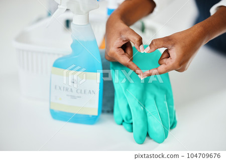 Heart hands, cleaning and chemical detergent bottle, closeup of supplies and cleaner with hygiene. Care, support and health with disinfectant spray, housekeeping and person with tools to clean 104709676