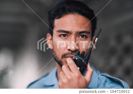 Security guard, walkie talkie or safety officer man outdoor for protection, patrol or watch. Law enforcement, serious face and duty with a crime prevention male worker in uniform for communication 104710052