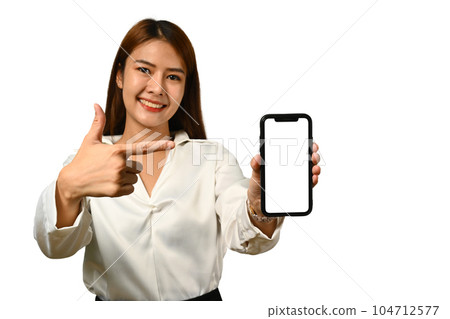 Beautiful woman showing mockup smartphone on background. White empty screen for your webpage or advertise text 104712577