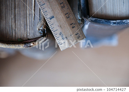 Book on old wooden table and a ruler. Back to school background. 104714427
