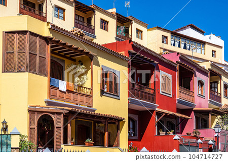 Teror at Gran Canaria, Spain. A beautiful traditional town with colorful houses Teror at Gran Canaria, Spain. A beautiful traditional town with colorful houses 104714727