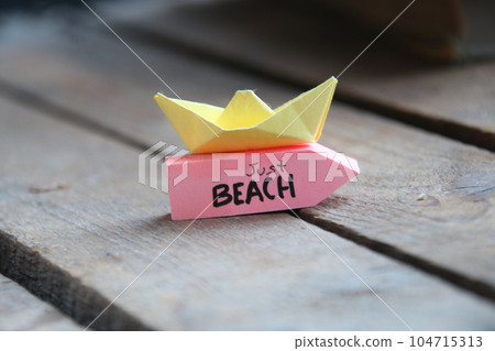 Just Beach Summer travel vacation concept. Paper boat and tag. Just Beach Summer travel vacation concept. Paper boat and tag. 104715313
