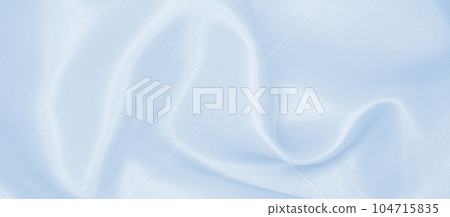 Smooth elegant blue silk or satin luxury cloth texture as abstract background. Luxurious background design Smooth elegant blue silk or satin luxury cloth texture as abstract background. Luxurious background design 104715835