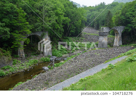 A railroad bridge that remains on the site of an abandoned railway line A railroad bridge that remains on the site of an abandoned railway line 104718276