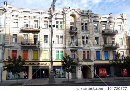 Kiev, Ukraine June 10, 2021: Facade of an old building on Khreshchatyk street in the city of Kiev Kiev, Ukraine June 10, 2021: Facade of an old building on Khreshchatyk street in the city of Kiev 104720577