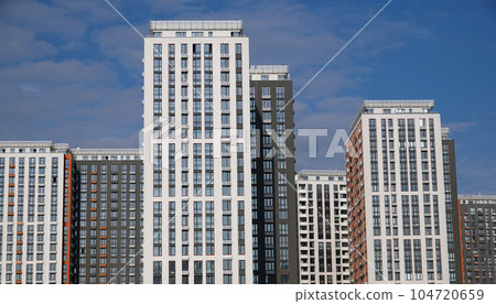 Kiev, Ukraine October 14, 2021: New city quarter with high-rise buildings in the city of Kiev Kiev, Ukraine October 14, 2021: New city quarter with high-rise buildings in the city of Kiev 104720659