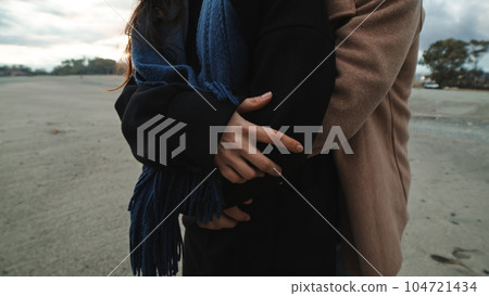 Boy Hug From Back His Girlfriend at beach 104721434