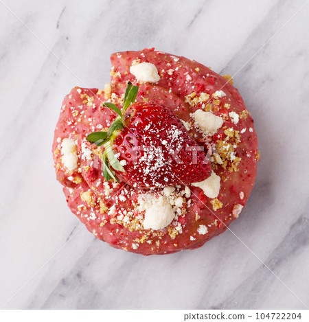 Strawberry shortcake donut on marble surface Strawberry shortcake donut on marble surface 104722204