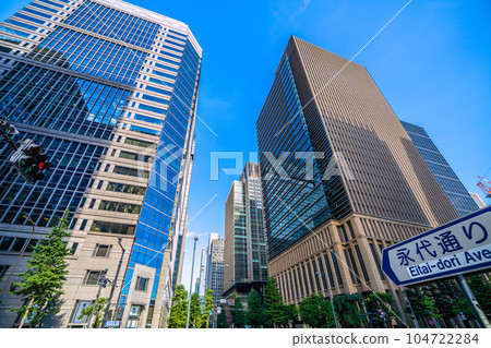 Tokyo cityscape in Japan July. Overlooking the office buildings at the Otemachi intersection = 6th Tokyo cityscape in Japan July. Overlooking the office buildings at the Otemachi intersection = 6th 104722284