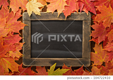 Fall background with a chalkboard Fall background with a chalkboard 104722410