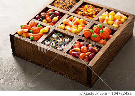 Halloween candy in a wooden box 104722421