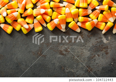 Candy corn Halloween background 104722443