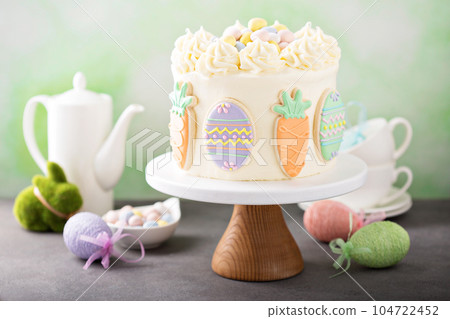 Carrot cake with frosting for Easter Carrot cake with frosting for Easter 104722452