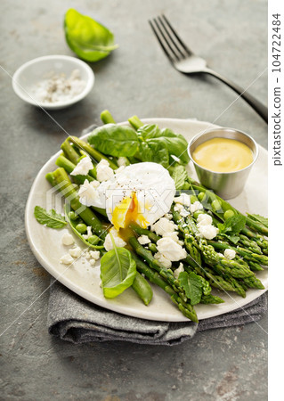 Green peas and asparagus with poached egg Green peas and asparagus with poached egg 104722484