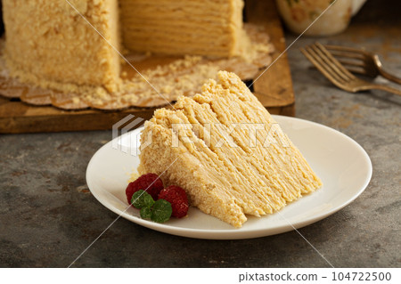 Napoleon layered cake with macarons and raspberry Napoleon layered cake with macarons and raspberry 104722500