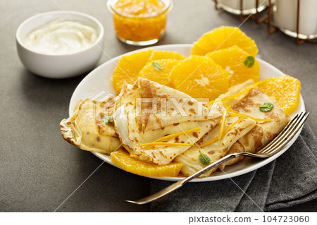 Crepes suzette with oranges 104723060