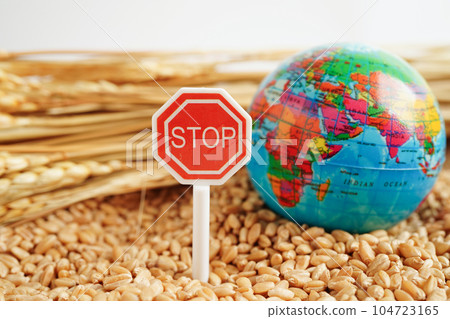 Bangkok, Thailand March 12, 2023 Wheat grains with stop sign, trade export and economy concept. 104723165