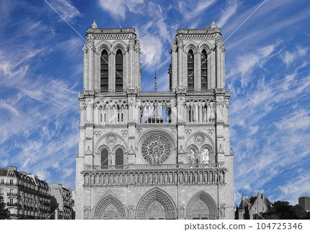 Notre Dame de Paris (against the background of sky with clouds), also known as Notre Dame Cathedral or simply Notre Dame, is a Gothic, Roman Catholic cathedral of Paris, France 104725346