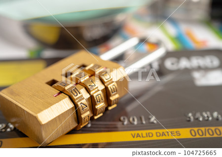 Credit card with password key lock and US dollar banknotes. Credit card with password key lock and US dollar banknotes. 104725665