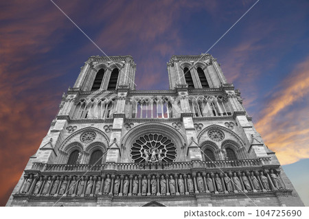 Notre Dame de Paris (against the background of a sky at sunset), also known as Notre Dame Cathedral or simply Notre Dame, is a Gothic, Roman Catholic cathedral of Paris, France Notre Dame de Paris (against the background of a sky at sunset), also known as Notre Dame Cathedral or simply Notre Dame, is a Gothic, Roman Catholic cathedral of Paris, France 104725690