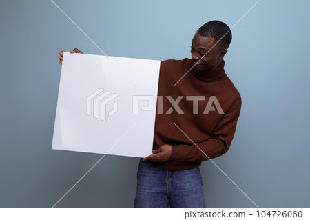 young african male student demonstrating his thesis using a whiteboard with mockup young african male student demonstrating his thesis using a whiteboard with mockup 104726060