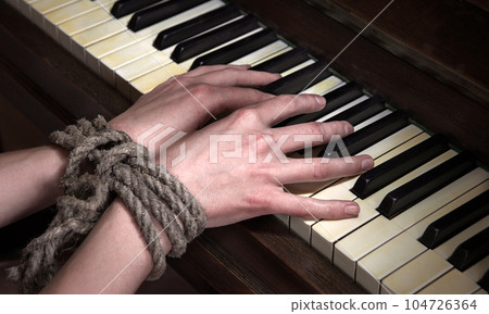 Play the piano with hands tied Play the piano with hands tied 104726364