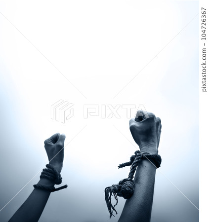 Tied hands break the rope 104726367
