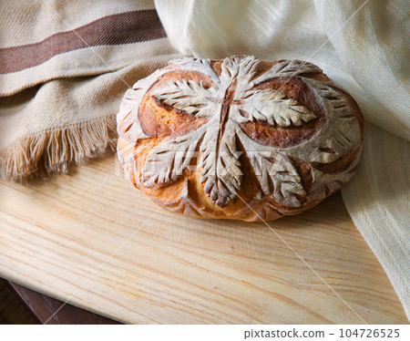 Tasty soft bread on the board Tasty soft bread on the board 104726525