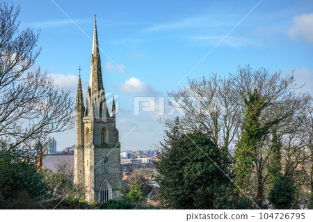Bell tower on Our Ladye Star of the Sea Roman Catholic Church, London city buildings in background, sunny day Bell tower on Our Ladye Star of the Sea Roman Catholic Church, London city buildings in background, sunny day 104726795