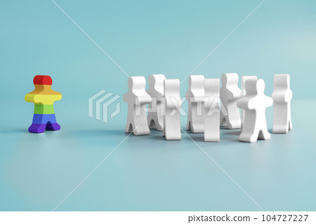 A lot of white figurines and one colored figurine as symbol of diversity A lot of white figurines and one colored figurine as symbol of diversity 104727227