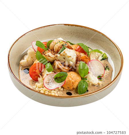 Portion of dish with ptitim and seafood Portion of dish with ptitim and seafood 104727583