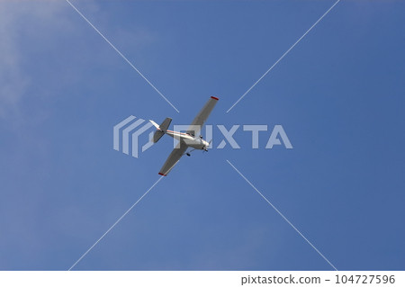 Blue sky and airplane 104727596