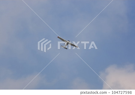 Blue sky and airplane 104727598