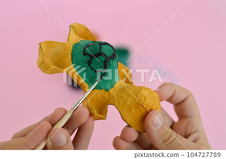 Step by step diy process. Step 4- using a brush and gouache, we paint the figure. Creativity, crafting. Zero waste concept. Step by step diy process. Step 4- using a brush and gouache, we paint the figure. Creativity, crafting. Zero waste concept. 104727789