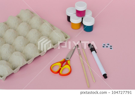 Step by step diy process. Step 1- preparation tools for handmade craft a turtle toy from a cardboard egg tray. Creativity, crafting. Zero waste concept. 104727791