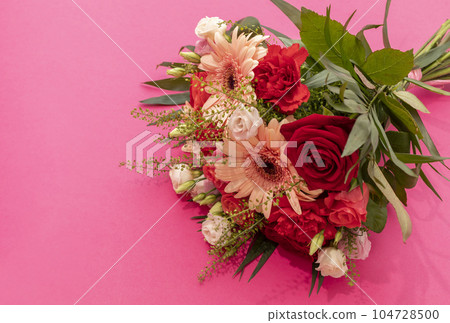 Top View Beautiful Fresh Bouquet Of Flowers For Bride Or Occasion On Pink Table, Copy Space. Colorful Mixed Gerbera, Roses, Chrysanthemum, Carnation Shabot, Green Leaves, Gerber. Horizontal Plane 104728500