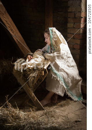 Mary and baby in a manger 104728505