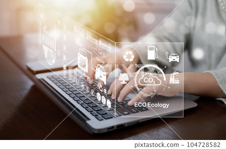 Businessman using laptops and touch recycle symbol with virtual modern reduce CO2 emission concept with icons, global warming emissions carbon footprint climate change to limit global warming, energy Businessman using laptops and touch recycle symbol with virtual modern reduce CO2 emission concept with icons, global warming emissions carbon footprint climate change to limit global warming, energy 104728582