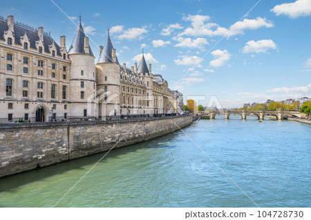 The Conciergerie - former courthouse and prison at river Seine in Paris, France The Conciergerie - former courthouse and prison at river Seine in Paris, France 104728730
