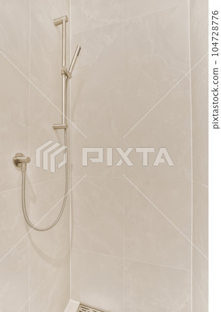 a shower that is clean and ready to be used for the bathroom reurrecturing purposess 104728776
