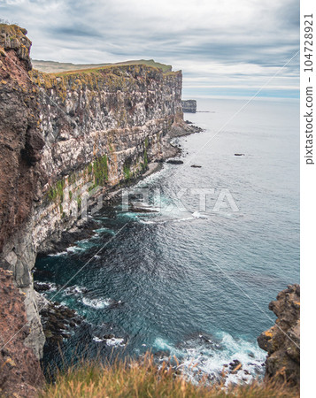 Panoramic view of Iceland at summer season with mountains and dramatic clouds 104728921